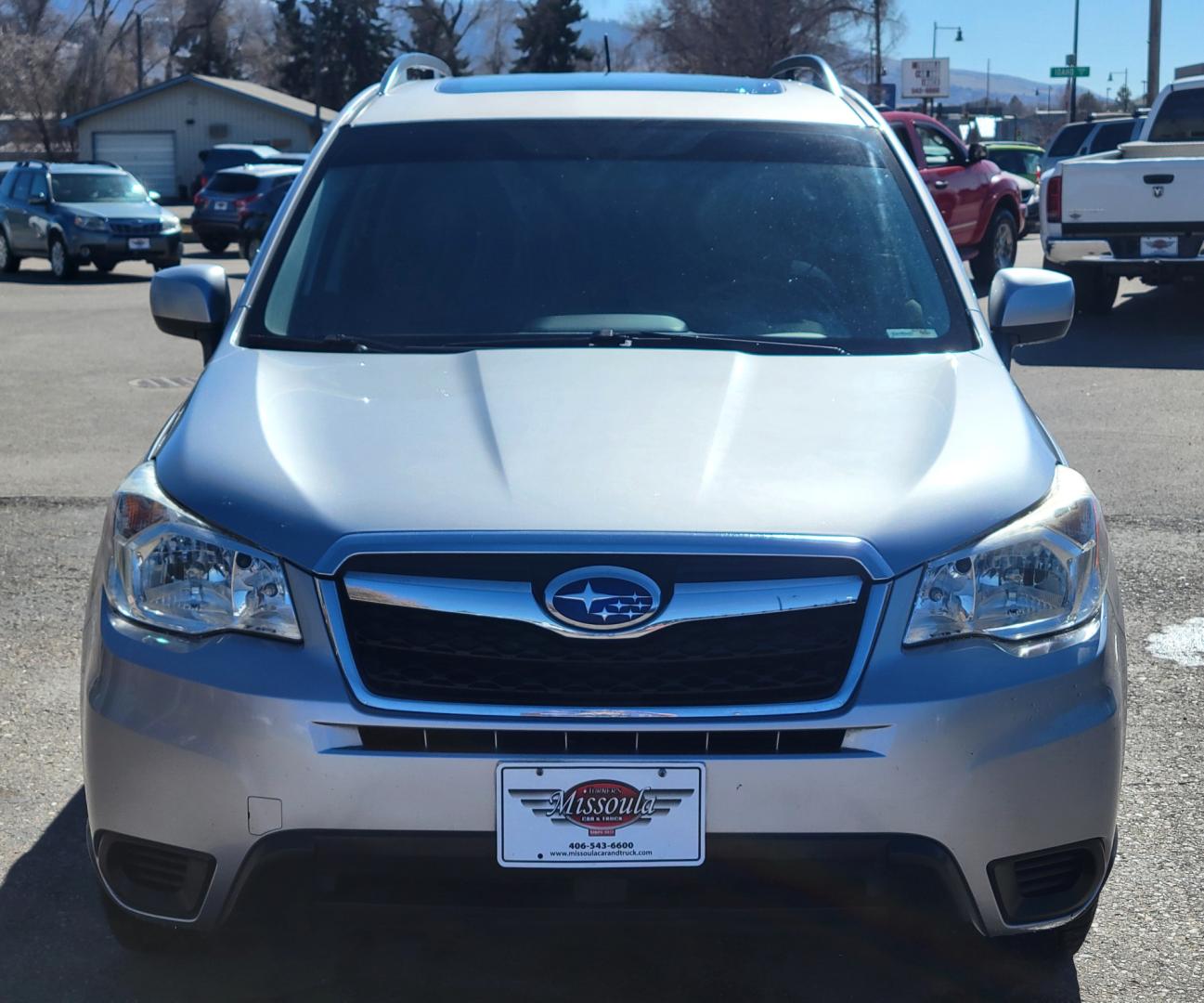 2015 Silver /Black Subaru Forester Premium (JF2SJADC3FH) with an 2.5L H4 engine, Automatic transmission, located at 450 N Russell, Missoula, MT, 59801, (406) 543-6600, 46.874496, -114.017433 - Photo#2